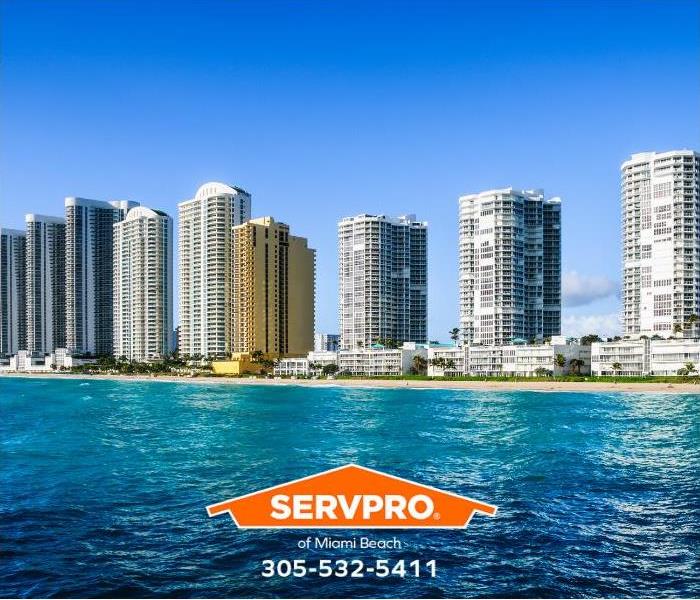 High-rise condominium buildings in North Miami are shown.